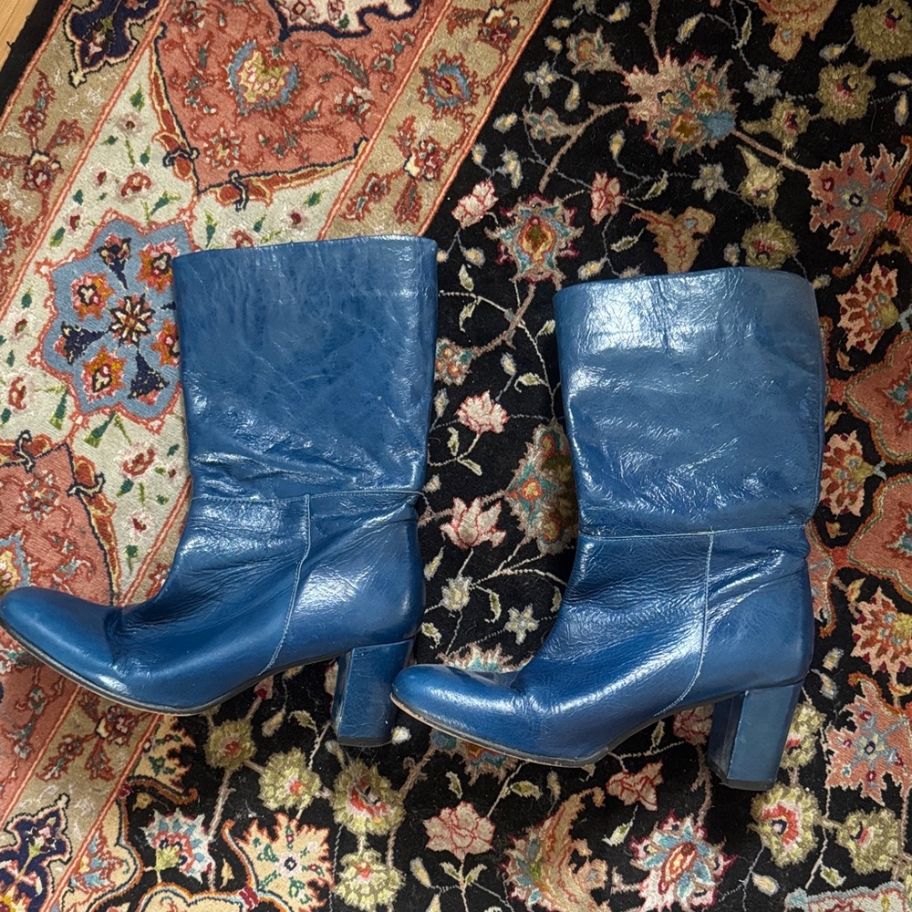 Intentionally blank blue leather boots